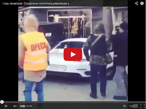 protestors in ukraine destroy porsche