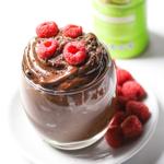 chocolate pudding in glass topped raspberries 
