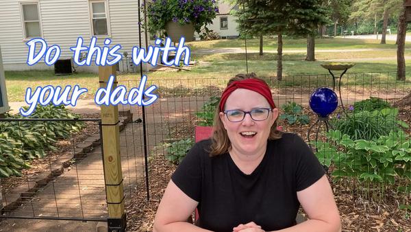 Blond woman talking in front yard