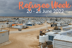 Storm clouds gather in Za'atari refugee camp. Text reads: Refugee Week, 20-26 June 2022