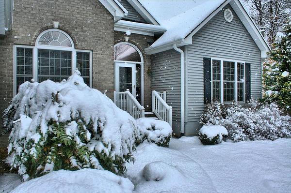 front of home in snow and cold