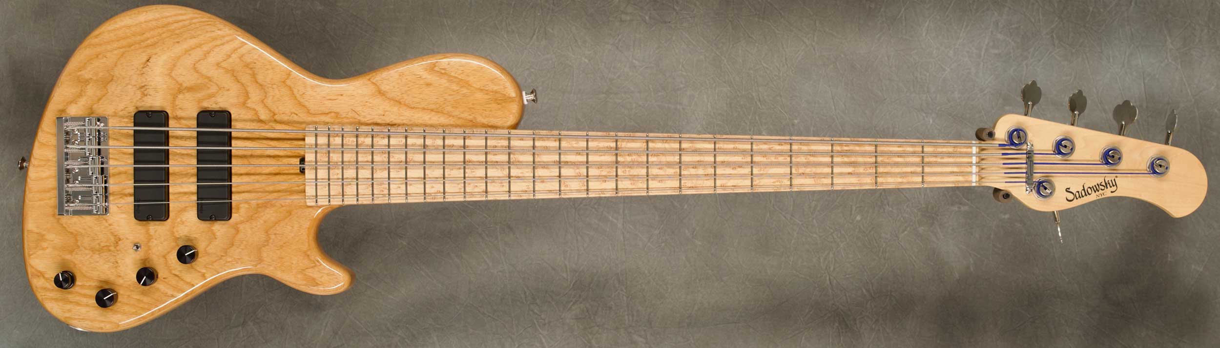 #8128 Natural 5-24 Single Cut Bass. 