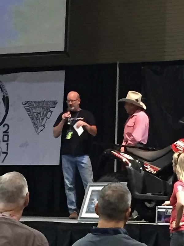 Sasquatch Coffee Founder, Gunnar Monson, presenting a $1,500 check at the International Bigfoot Conference