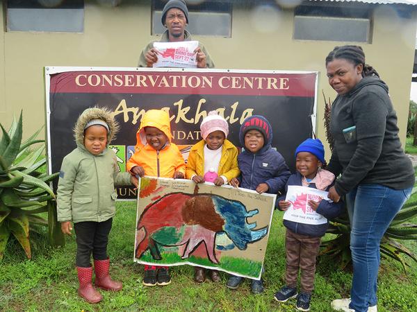 Young learners at celebrating World Rhino day with colouring pictures