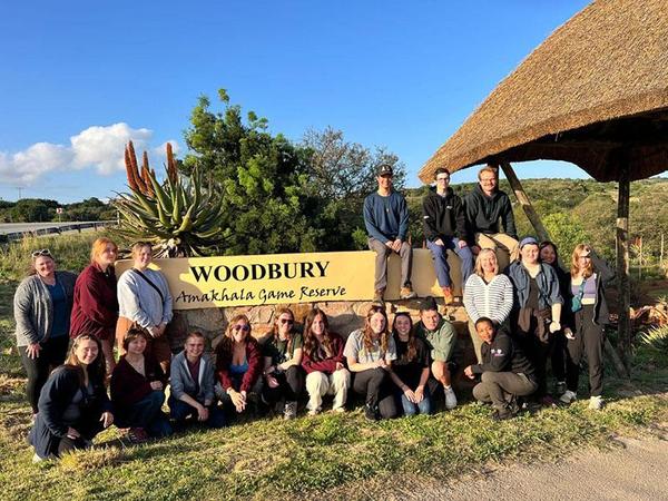 Group of students standing in front of Woodbury Tented Camp