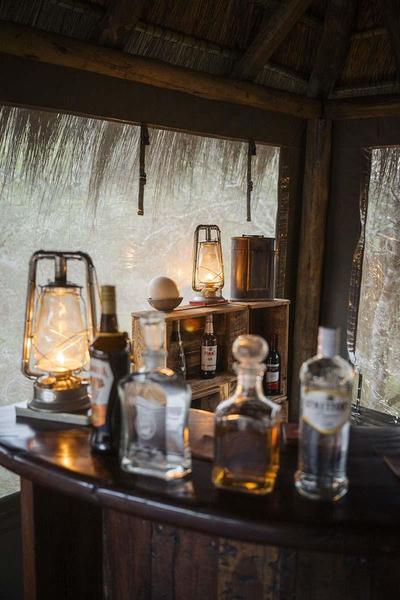 Bar at Quartermain's 1920's Safari Camp showing various bottles