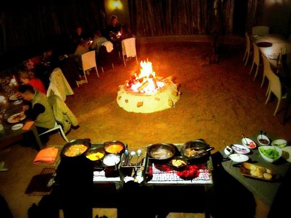 Dinner arount the firepit at Safari Lodge