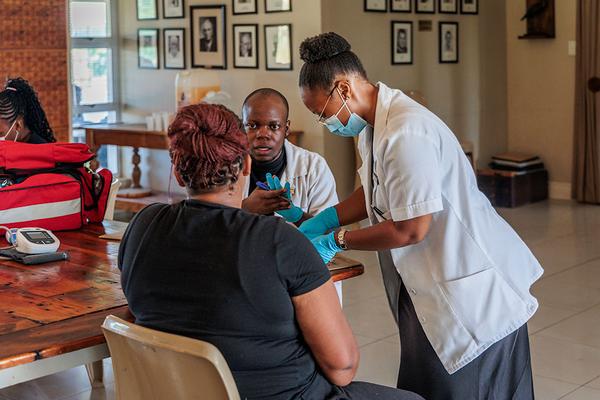 Medical professionals during a consultation with the health outreach program