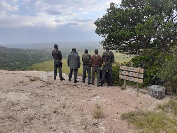 Men observing World Rhino Day