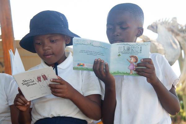 Young learners reading books