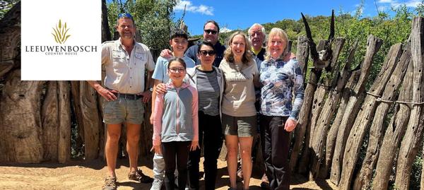 Group of people posing for photos