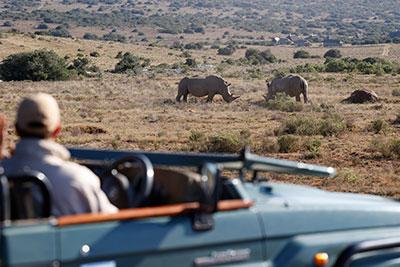 Staff in front of lodge
