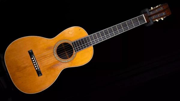 https://www.guitarworld.com/news/martin-parlor-guitar-1870s?