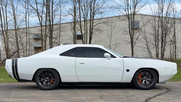 https://robbreport.com/motors/cars/exomod-concepts-dodge-challenger-hellcat-reimagined-as-1968-dodge-charger-1234845029/#recipient_hashed=ef700ccf564eca85e84bcdaa0ea479b8cf26d432f2551f92503239595be8a2f6&recipient_salt=30d317aaf1c3c91012eded8710ce912982d0e9d6d0a2f7f1351c531d7d8bdbf5