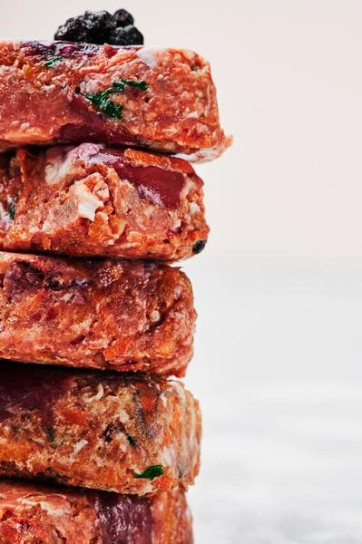 A stack of raw, cutlet squares (red meat - beef)