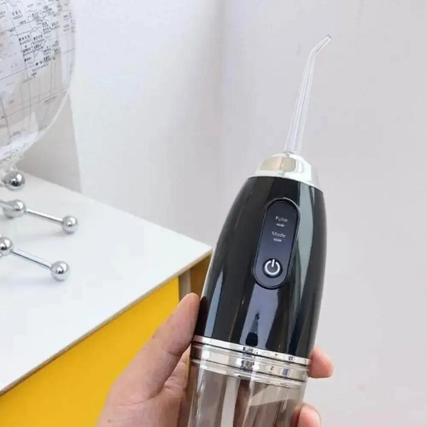 Irrigador dental recargable