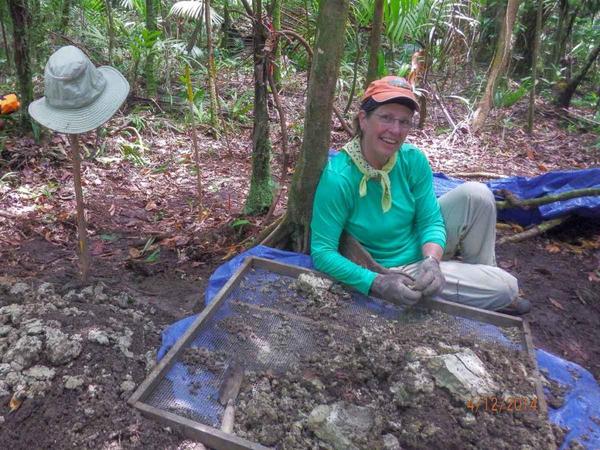  Schumacher, niece of 2nd Lt. Arthur J. Schumacher, excavates artifacts with Project Recover under supervision of team’s lead archaeologist.