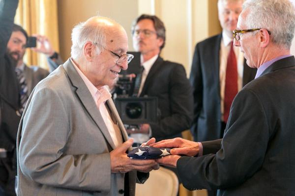 Nephew Dennis receiving flag from Project Recover at the memorial of William Punnell