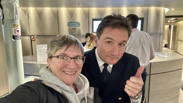 Sheila Gallant-Halloran of Lush Life Travel with With Captain Patrick Marchesseau aboard Le Commandant Charcot.