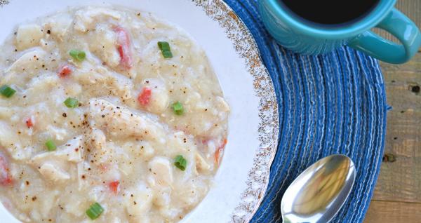 chicken and dumplings in a large bowl with coffee on the side