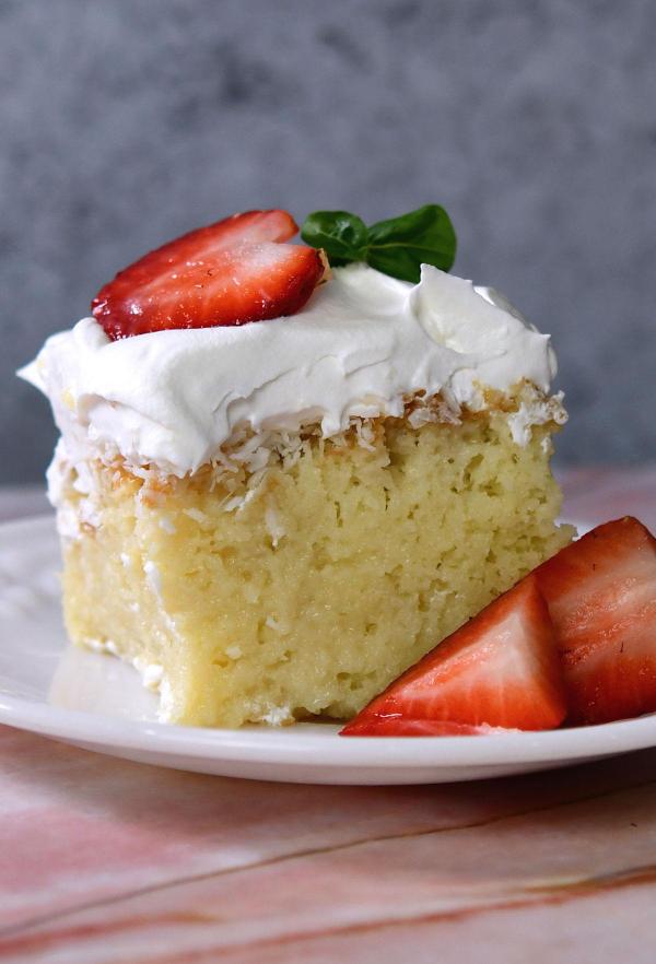 closeup of one pice of coconut tres leches cake