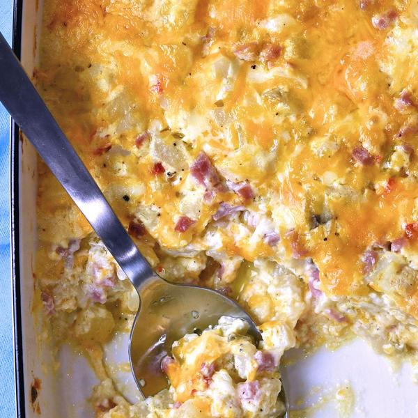 potatoes, ham and cream baked together in a casserole dish