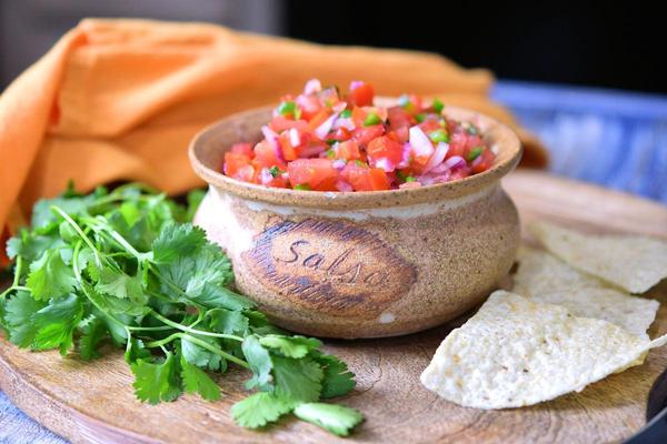pico de gallo fresh salsa in a clay bowl