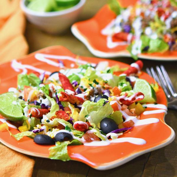 taco salad in an orange vintage bowl