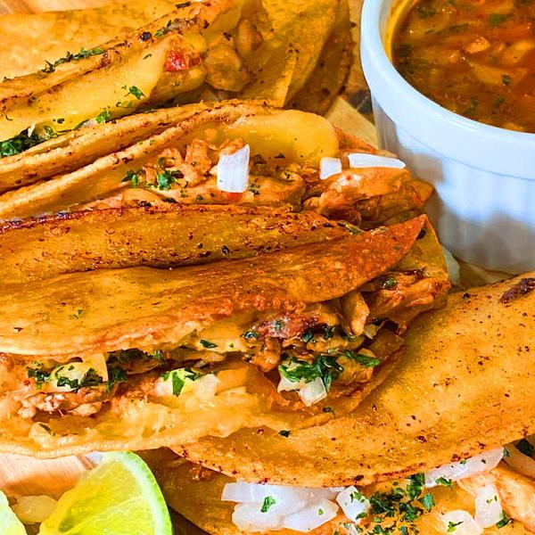 closeup of Chicken Birria Tacos