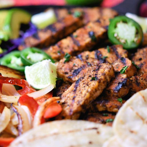 vegetarian fajitas freshly grilled on an iron skillet