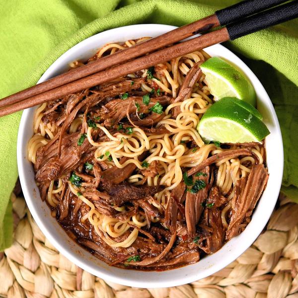 beef birria in a bowl of ramen noodles