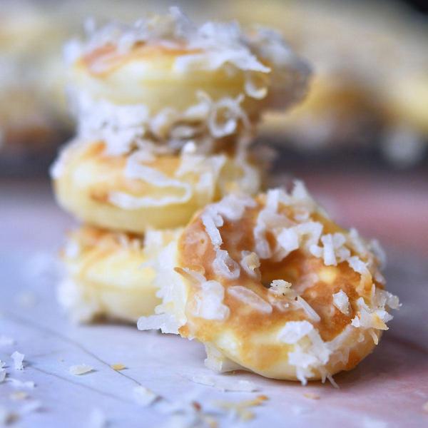small stack of mini coconut donuts