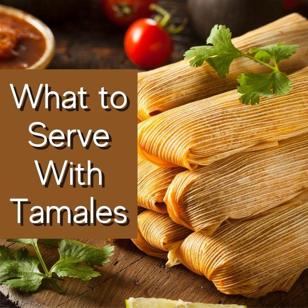 small stack of tamales on a wooden cutting board