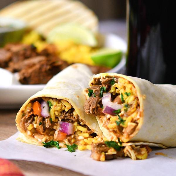 chipotle barbacoa burrito on a cutting board
