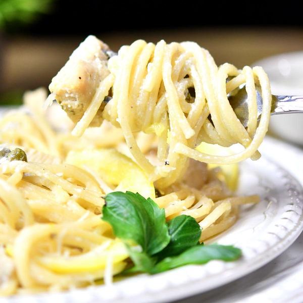 closeup of fork with lemon chicken spaghetti