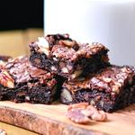 dark chocolate brownies on a cutting board