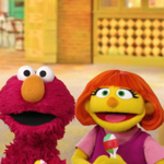 A photo of Elmo with another Sesame Street puppet
