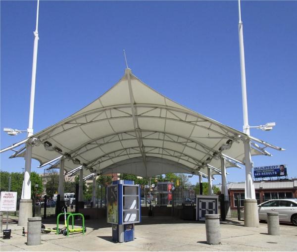 metro station with cover over passenger area