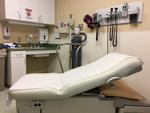 Exam table in gynecologist's office