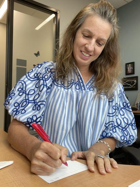 Writer sitting on chair
