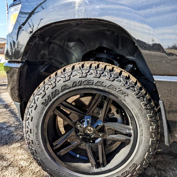 Aftermarket Wheels with Rough Country Lift Kit on Truck