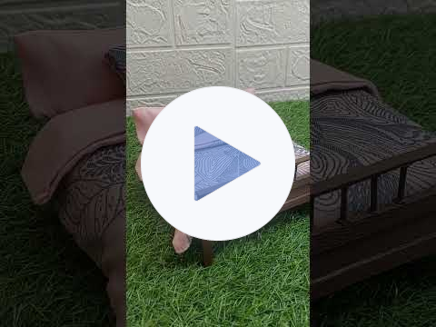 DIY dolllhouse bed frame made from popsicle sticks