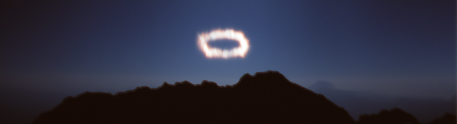 A luminous moon glowing above a dark mountain silhouette under a deep blue night sky