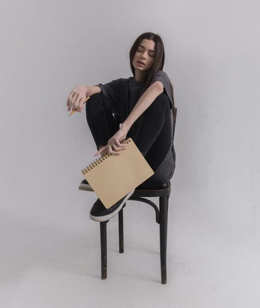 Writer sitting on chair