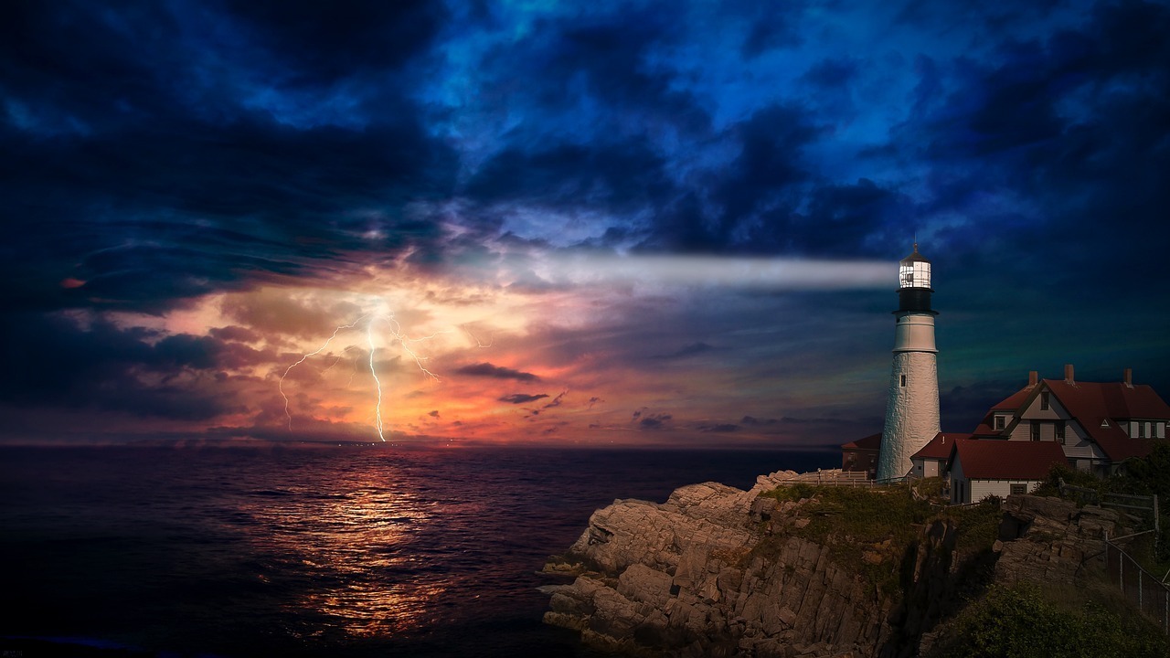 A lighthouse casting its beam across a stormy dusk sea as lightning strikes in the distance