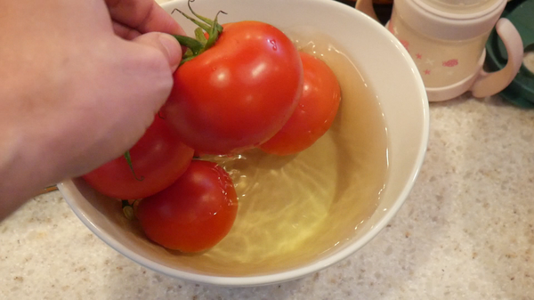 Washing Pesticides Off Tomatoes in the 'Water Of Champions'