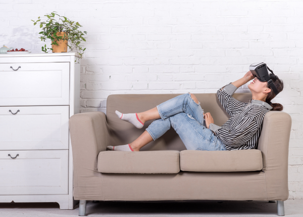 woman undergoing virtual reality therapy treatment in the comfort of her own home