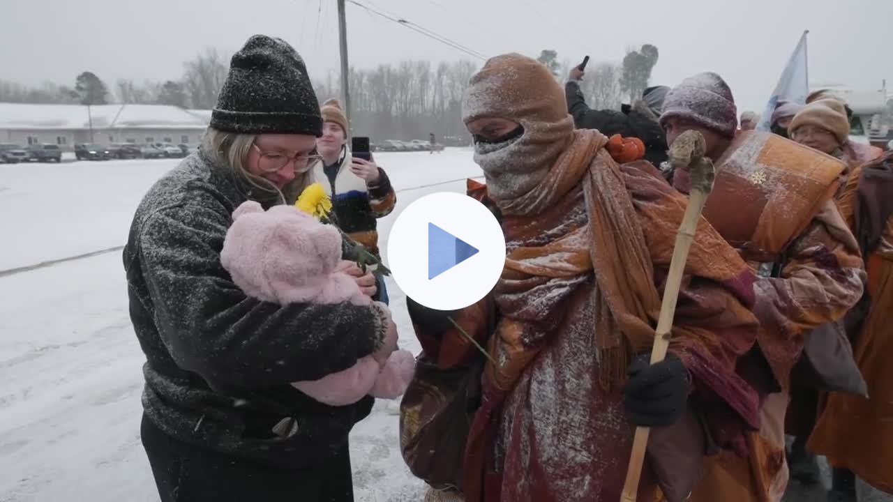 Thousands wait hours to see Buddhist monks' peace walk through Petersburg: 'You can see the love'