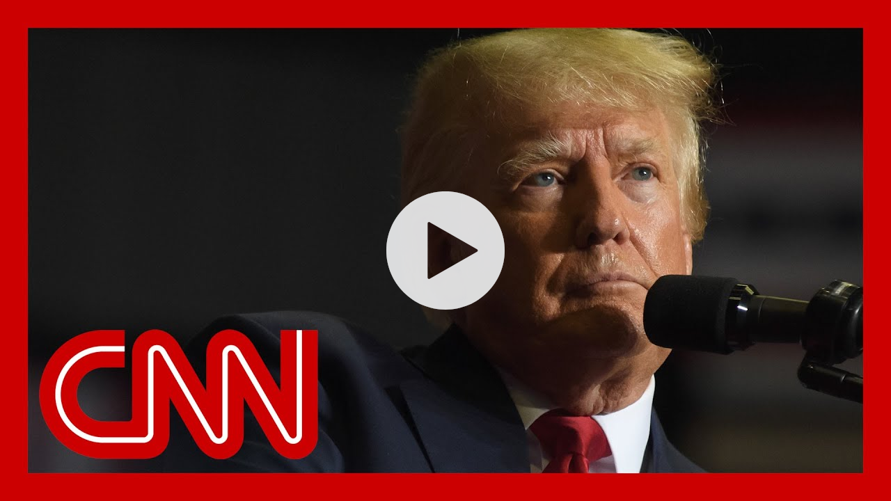 Trump makes more overt reference to conspiracy group