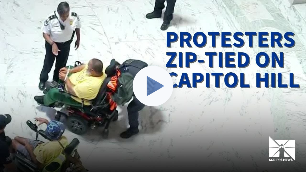 People in wheelchairs zip-tied and escorted out of Capitol during Medicaid cuts protest